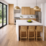 Modern Austin kitchen remodel with custom wood cabinets, large quartz island countertop, and stainless steel appliances