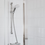 white tile shower walls guest bathroom remodel Pflugerville TX
